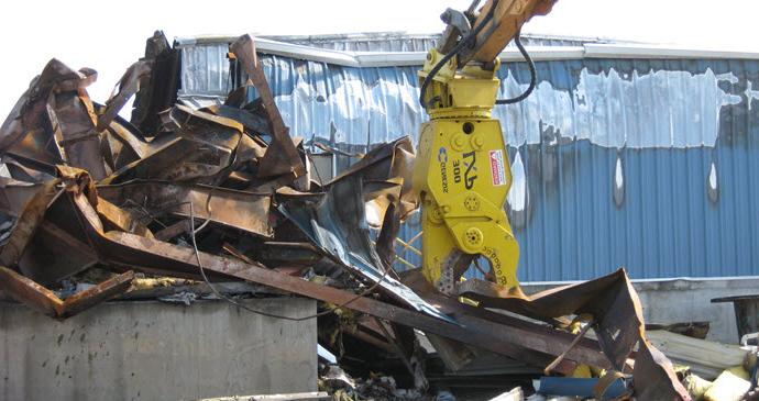 Genesis LXP 300 Shear Jaw working in demolition application